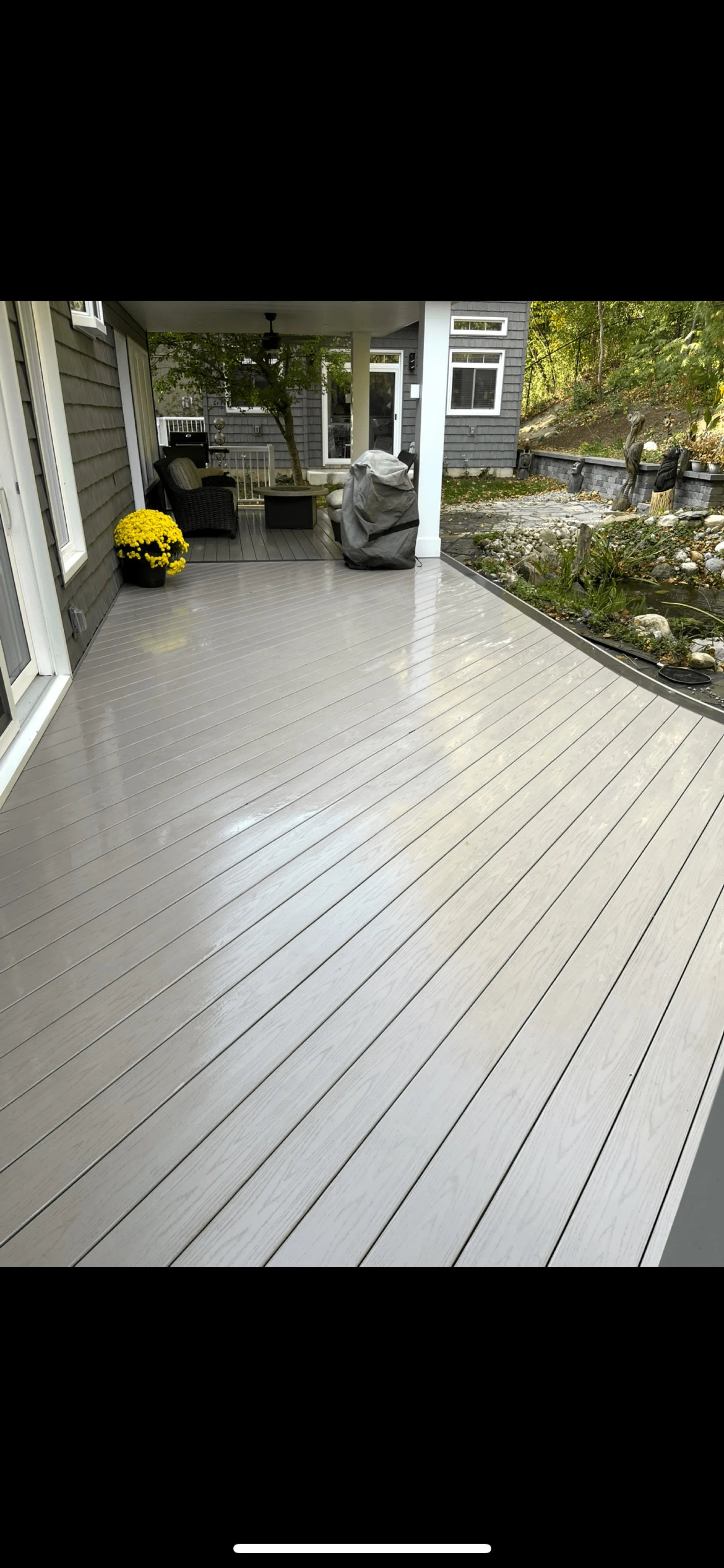 Spring pressure washing a driveway in Cambridge Ontario